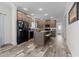 Open kitchen with island and stainless steel appliances at 117 Hinshaw Shop Rd, Liberty, NC 27298