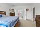 Main bedroom with access to the bathroom and walk in closet at 117 Hinshaw Shop Rd, Liberty, NC 27298