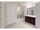 Bathroom with a glass-enclosed shower, vanity with dark wood cabinets, and modern fixtures at 120 Anise Tree Way, Clayton, NC 27527