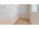Spacious walk-in closet with neutral carpeting and adjustable wire shelving for optimal storage solutions at 120 Anise Tree Way, Clayton, NC 27527