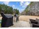This backyard offers a BBQ, patio seating, and a playground, perfect for Gathering gatherings at 12420 Tetons Ct, Durham, NC 27703