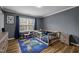 This is a cute bedroom with a wooden toddler bed, natural light and decor at 12420 Tetons Ct, Durham, NC 27703