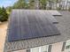 Close up of roof with solar panels, showcasing this home's energy efficiency at 12420 Tetons Ct, Durham, NC 27703