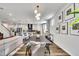 Open floorplan view of dining area next to kitchen and living room at 1300 Ringlet Run, Fuquay Varina, NC 27526