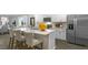 Open concept kitchen features an island and stainless steel appliances at 1316 White Verona Way, Knightdale, NC 27545