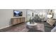 Spacious living room with comfortable seating and a large TV at 1316 White Verona Way, Knightdale, NC 27545