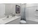 Clean bathroom with a white vanity, tub, and shower at 1320 White Verona Way, Knightdale, NC 27545
