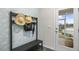 Entryway with bench, hat rack, and view to backyard at 1320 White Verona Way, Knightdale, NC 27545
