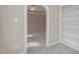 Hallway with built-in shelving and access to bedroom at 203 Anniston Ct, Cary, NC 27519