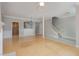Open living room and dining area with hardwood floors at 203 Anniston Ct, Cary, NC 27519