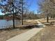 Exterior view of the community walking path near the lake, perfect for outdoor activities at 203 Anniston Ct, Cary, NC 27519