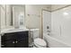 Traditional bathroom features a sleek vanity and shower-tub combo at 245 E Webber Ln, Clayton, NC 27527