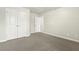 Cozy bedroom featuring a closet and an adjacent room at 245 E Webber Ln, Clayton, NC 27527