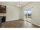Bright dining area with sliding glass doors leading to the backyard at 245 E Webber Ln, Clayton, NC 27527