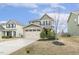 Beautiful two-story home with two-car garage, blue skies, and well-maintained lawn at 245 E Webber Ln, Clayton, NC 27527
