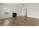 Spacious living room with a fireplace and plenty of natural light at 245 E Webber Ln, Clayton, NC 27527