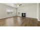 Bright living room featuring a fireplace and large windows at 245 E Webber Ln, Clayton, NC 27527