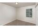 Spacious bedroom with carpeted floor and window at 3713 Phillips W Way, Durham, NC 27713