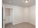 Simple bedroom with carpet and access to hallway at 3713 Phillips W Way, Durham, NC 27713