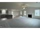 Spacious living room with hardwood floors, a fireplace, and an open floor plan at 395 Magnolia Run Way, Benson, NC 27504