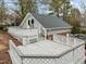 Spacious deck with white railings and stairs at 4532 Malvern Rd, Durham, NC 27707