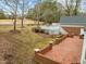 Elevated deck overlooking expansive backyard and trees at 4532 Malvern Rd, Durham, NC 27707