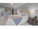 Main bedroom with a large bed and access to a walk-in closet at 4532 Malvern Rd, Durham, NC 27707