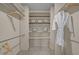 Spacious walk-in closet with ample shelving and hanging space at 4532 Malvern Rd, Durham, NC 27707