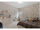 bedroom with a unique terrazzo-patterned wall at 505 Great Eno Path, Hillsborough, NC 27278