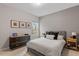 Cozy bedroom featuring a dresser and a comfortable bed at 505 Great Eno Path, Hillsborough, NC 27278