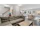 Open concept living space with a sectional sofa and adjacent dining area at 505 Great Eno Path, Hillsborough, NC 27278