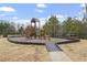 Community playground with playset and bench at 505 Great Eno Path, Hillsborough, NC 27278