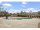 Community pool with concrete deck and surrounding area at 505 Great Eno Path, Hillsborough, NC 27278