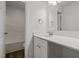 Modern bathroom featuring a new vanity with white countertop, updated fixtures, and a bath/shower combo at 5110 Chipstone Dr, Raleigh, NC 27610