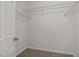 Walk-in closet with built-in wire shelving for organization and storage at 5110 Chipstone Dr, Raleigh, NC 27610