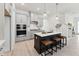 Contemporary kitchen boasting an island with bar stools, stainless steel appliances, and ample cabinet space at 528 Gainer Dr # 8, Raleigh, NC 27610