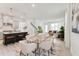 Bright and airy living area with a dining table, comfortable seating, and modern finishes throughout at 528 Gainer Dr # 8, Raleigh, NC 27610