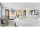Comfortable bedroom with a TV and a dresser, providing ample storage at 5410 Thayer Dr, Raleigh, NC 27612