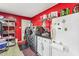 Well-organized laundry room with modern washer and dryer, and ample storage space at 5410 Thayer Dr, Raleigh, NC 27612