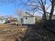 A charming home featuring a backyard deck and convenient access to the back door at 611 Rowland St, Henderson, NC 27536
