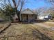 A charming home that features a newly renovated screened-in porch and an ADT security system at 611 Rowland St, Henderson, NC 27536