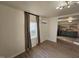 Bright living room featuring modern lighting, wood floors, and view into kitchen at 611 Rowland St, Henderson, NC 27536