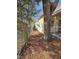 A charming home featuring a full-property length yard and convenient access to the screened-in porch at 611 Rowland St, Henderson, NC 27536