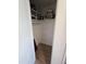 A storage closet featuring ample storage space and newly installed wood-look floors at 611 Rowland St, Henderson, NC 27536