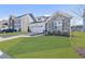 A beautifully designed home with a stone facade, spacious lawn, and a convenient two-car garage at 612 Sweet Pine Ln, Knightdale, NC 27545