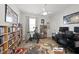 Home office with ample workspace, storage, movie collection, and natural light at 612 Sweet Pine Ln, Knightdale, NC 27545