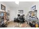 Spacious home office with multiple workstations, ample storage, and natural light at 612 Sweet Pine Ln, Knightdale, NC 27545