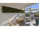 Relaxing screened porch with comfortable seating and outdoor views at 612 Sweet Pine Ln, Knightdale, NC 27545