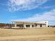Community clubhouse with landscaping and modern design at 621 Leland Hl Cir, Zebulon, NC 27597