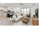 Open-concept living room featuring modern furnishings and abundant natural light at 632 Gainer Dr # 19, Raleigh, NC 27610